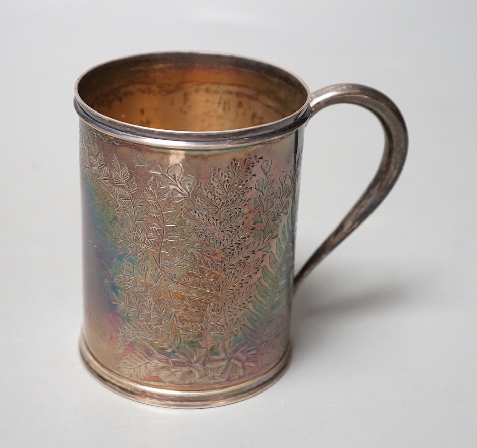 A Victorian engraved silver christening mug, Thomas Bradbury & Sons, London, 1874, 91mm.